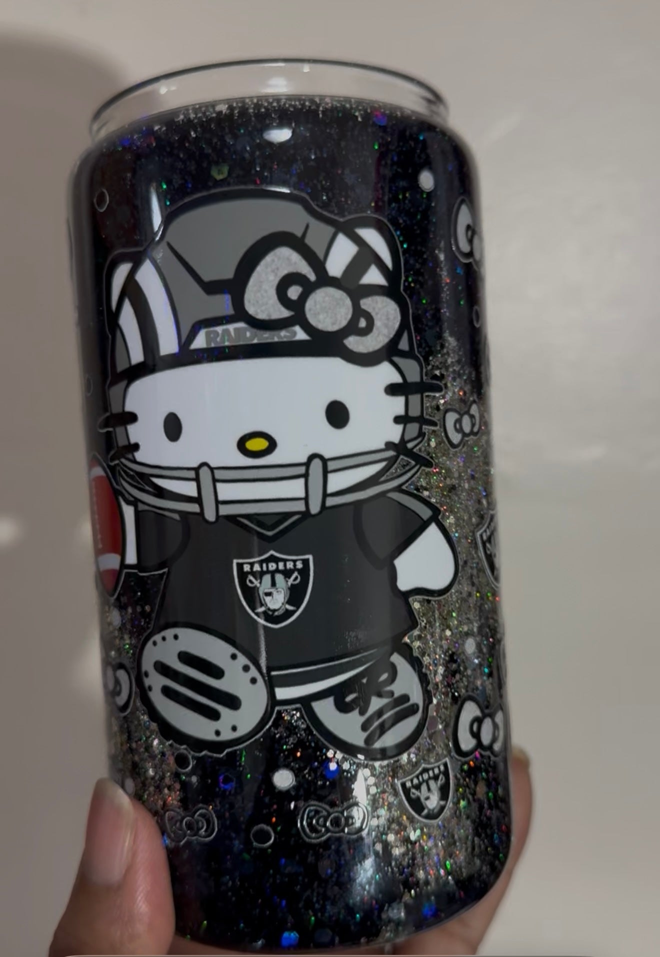 Glass 16oz Glitter Hello Kitty/Raiders Snow Globe